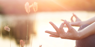 Woman meditates in the morning