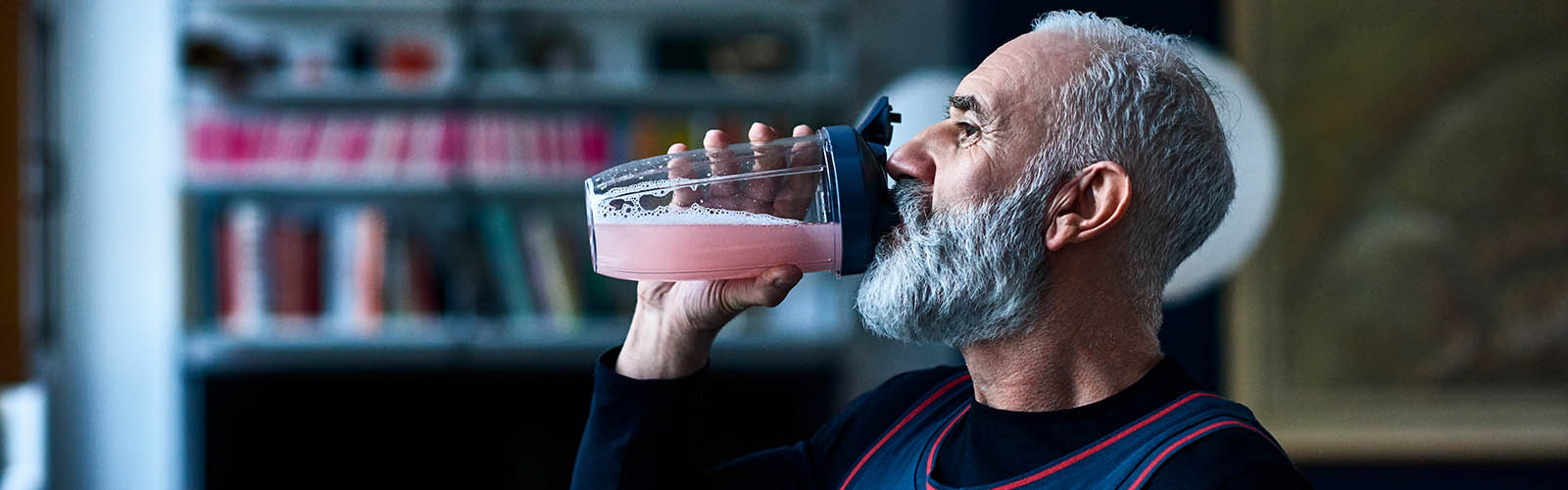 man drinking smoothie